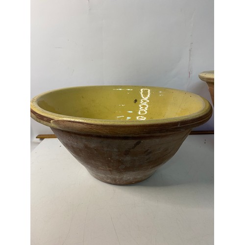 474 - 2 x large glazed terracota mixing bowls largest measures 42 cms diameter