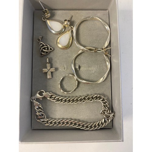 284 - Assortment of 925 silver jewellery including curb bracelet and ear-rings.