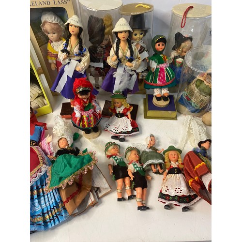 291 - Box of vintage dolls, traditional dress and souvenir style plus 2 vintage puppets