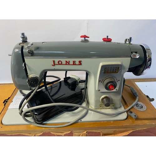 188 - Jones electric sewing machine with carry case.