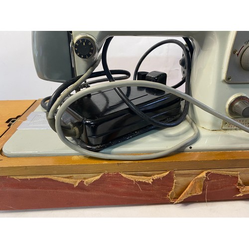 188 - Jones electric sewing machine with carry case.