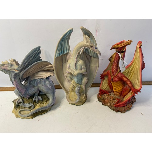 300 - Collection of 7 Danbury Mint dragon figures from various series.