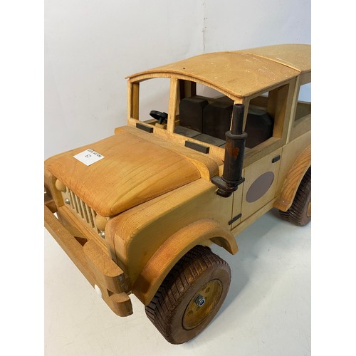 67 - Large wooden model of a Landrover Jeep 4x4. 47x27cms