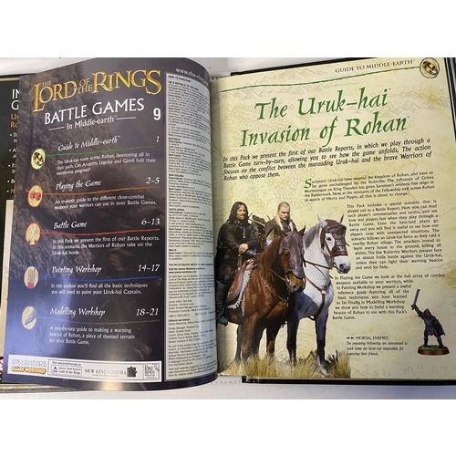 25 - Lord of the Rings battle games and Middle Earth magazines in folder.