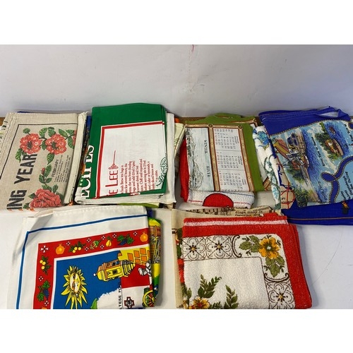 223 - Basket of vintage tea towels