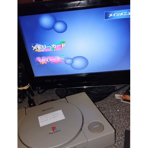 210 - Sony Playstation 1 Japanese console. Model SCPH-5000 [NTSC-J] with games, tested and working.