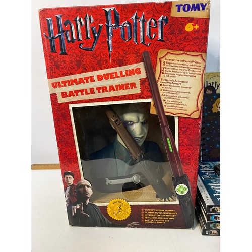 618 - Selection of Harry Potter items including books and DVD's