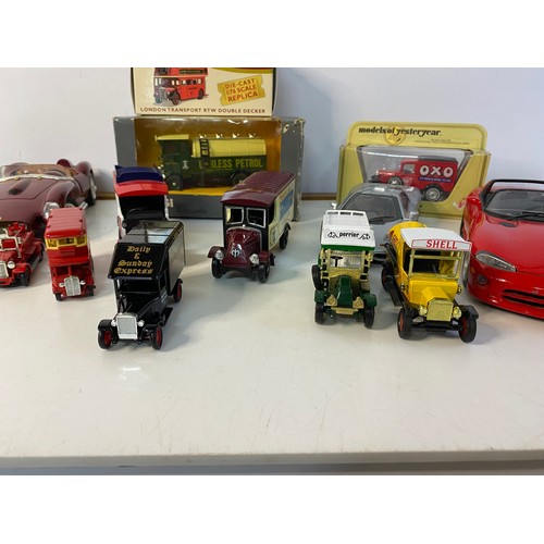 647 - Box of assorted model vehicles from Corgi, Burago and Lledo.