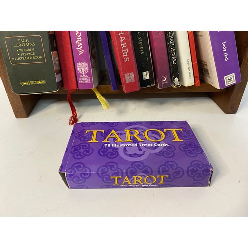 659 - Collection of books on Tarot, Crystals and spells. Also sets of Tarot cards presented on a vintage o... 