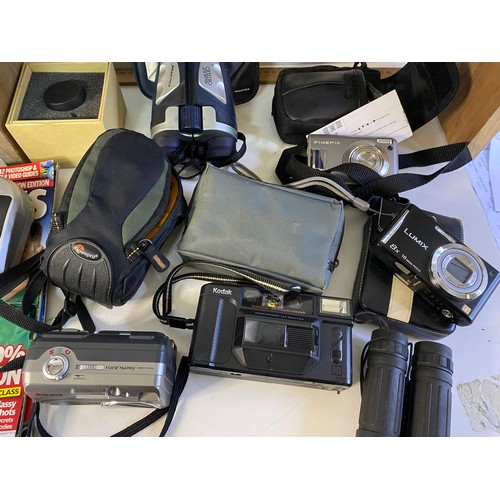 688 - Box of cameras and binoculars including Reef Master underwater camera, various digital and 35mm came... 