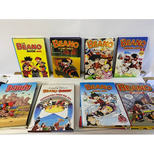 691 - 2 boxes of Dandy and Beano annuals plus special editions.