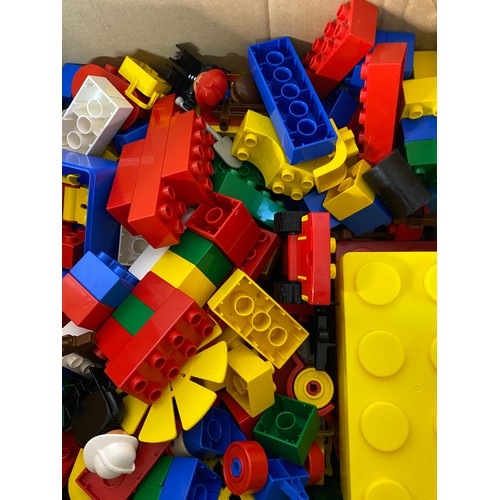 692 - Large box of Lego Duplo with selection of blocks, figures and vehicles.