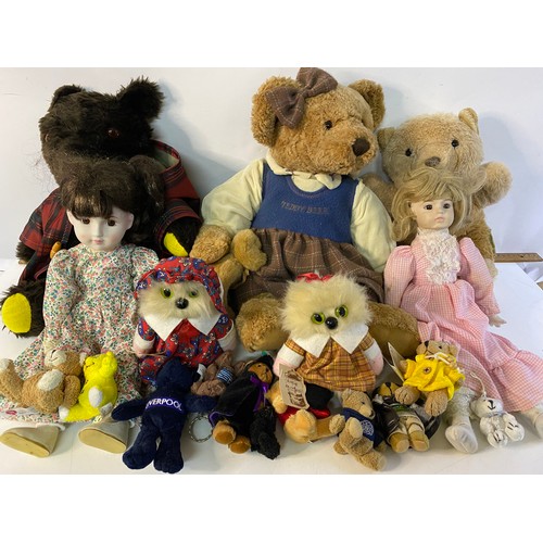 699 - Assortment of vintage dolls and bears.