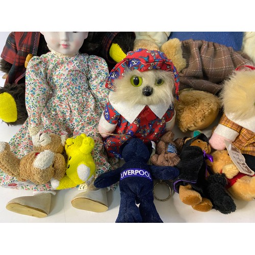 699 - Assortment of vintage dolls and bears.