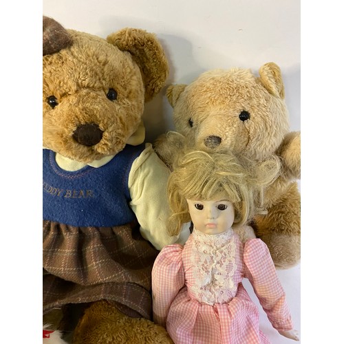 699 - Assortment of vintage dolls and bears.