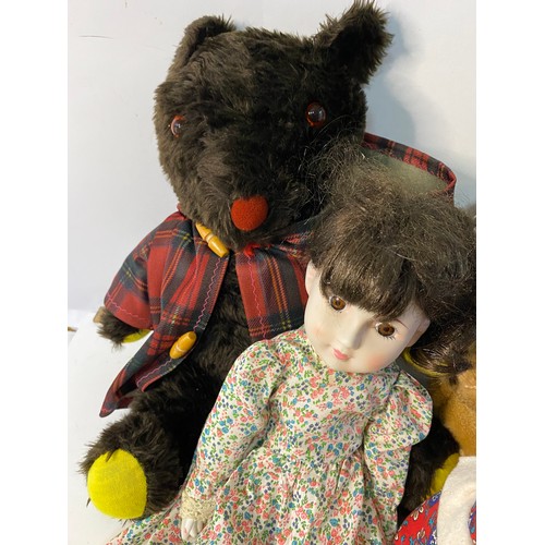 699 - Assortment of vintage dolls and bears.