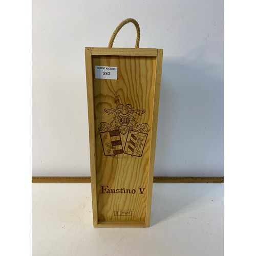 980 - Bottle of Faustino I Tinto Grand Reserve Rioja red wine, in wooden box.