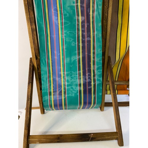 975 - Pair of vintage seaside deckchairs