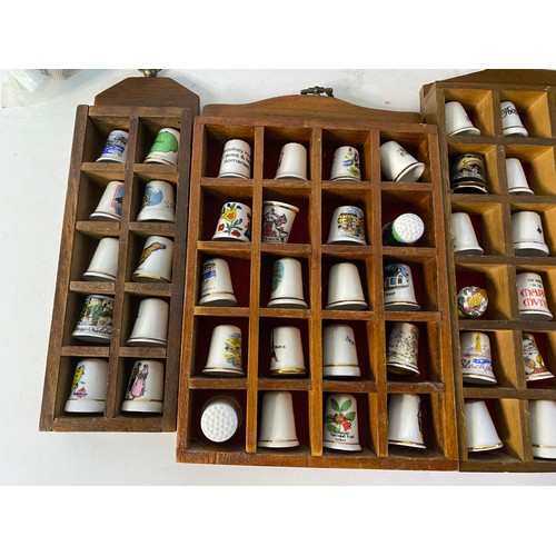 966 - Collection of 196 thimbles and display cases