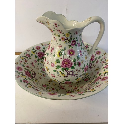 965 - Large James Kent washbowl and jug with floral pattern. Jug measures 29cms tall, crack on bowl