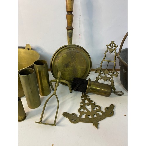 955 - Collection of brassware including jam pots, ammunition shells, hot water bottle etc