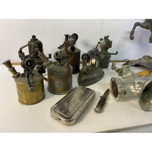 882 - Selection of metalware including blow torches, cardbide lamps, pewter horse, iron etc