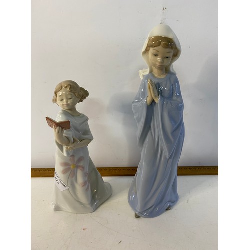 875 - 4 x Nao figurines, 'brass melody, 'cheeky cherub', 'pretty poems' and 'girl praying' tallest is 28cm... 