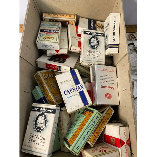 507 - Box of vintage cigarette cards and old cigarette packets.