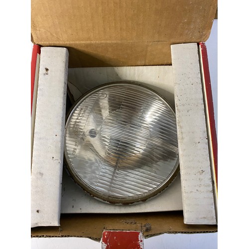 564 - Vintage Cibie motorcycle halogen headlight, unused in box.