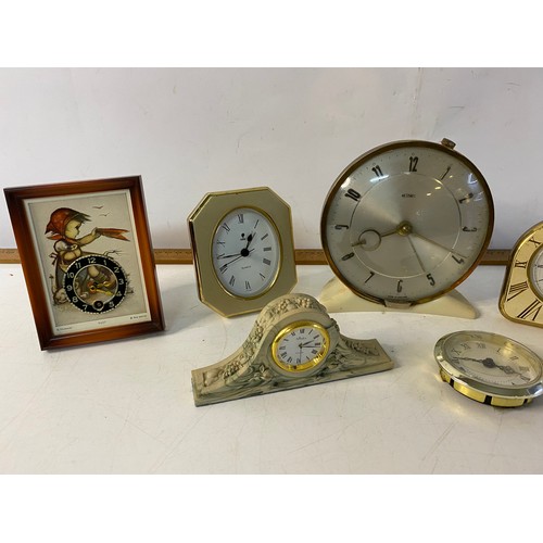 813 - Selection of 7 x clocks, makes include Hummel, Elite, Waterford, Metamec etc