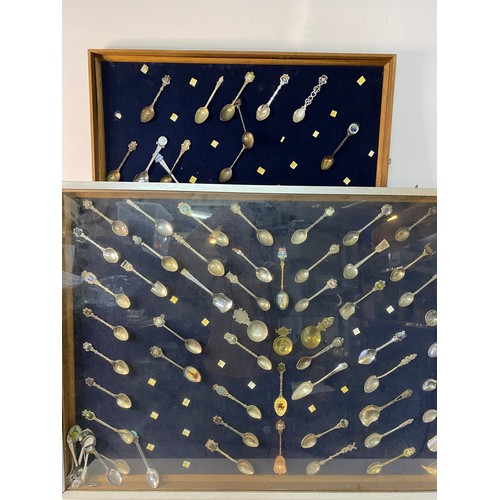 831 - Large collection of collectable spoons in 3 x framed display cases, one with glass measuring 62x88cm... 