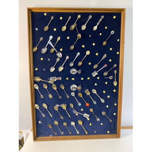 831 - Large collection of collectable spoons in 3 x framed display cases, one with glass measuring 62x88cm... 