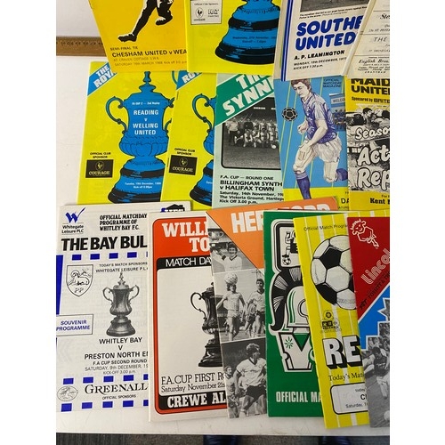 551 - Collection of football programmes many featuring non league clubs.