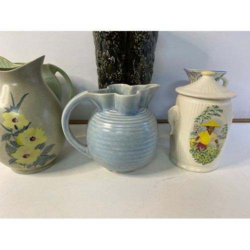 729 - Collection of 1930's to 1950's era jugs and vases including Arthur Wood, Beswick, Sylvac etc