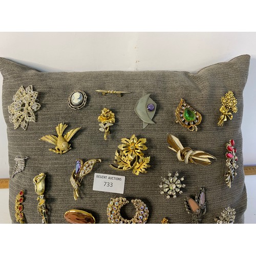 733 - Cushion of brooches, mostly vintage