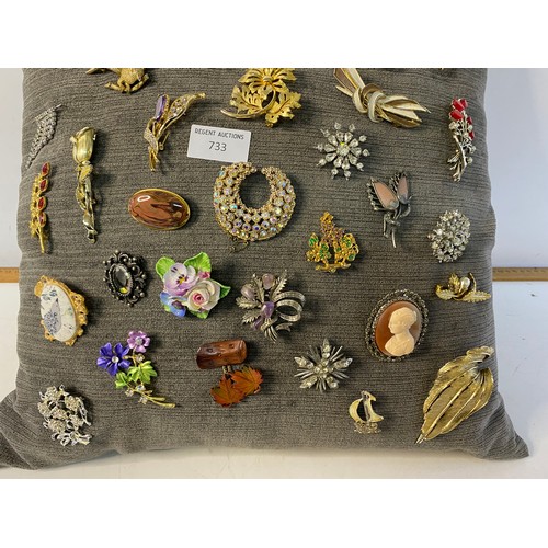 733 - Cushion of brooches, mostly vintage