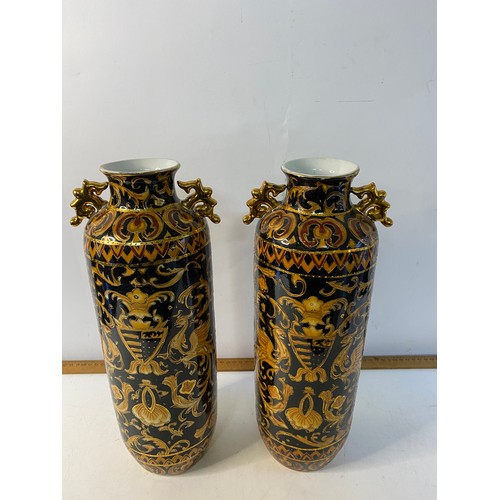 754 - Pair of decorative 36 cms tall Chinese vases and a matching jug