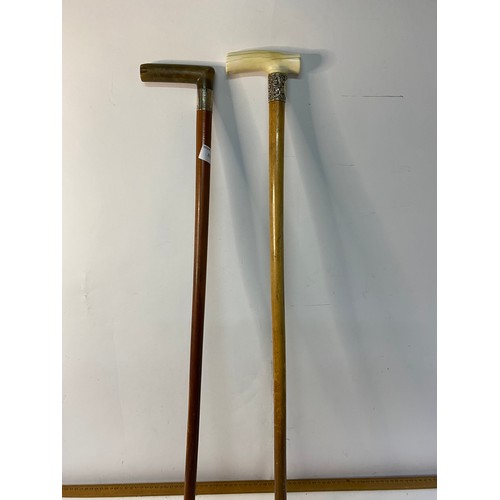 837 - 2 x walking sticks with silver plate collars