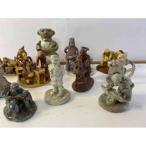 913 - Large collection  of Big Nose Studio pottery figures. Tallest is 16cms