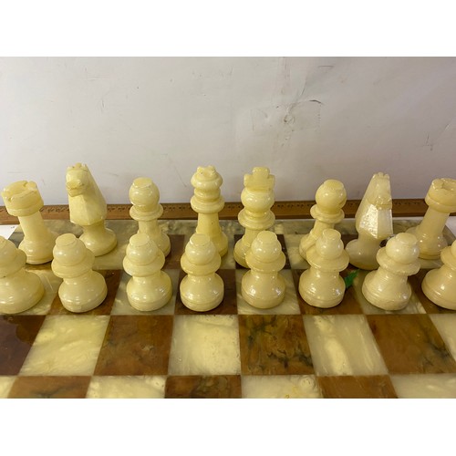 923 - Onyx chess set with board and pieces.