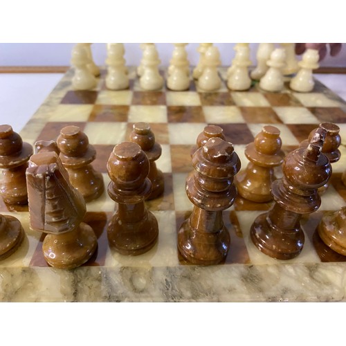 923 - Onyx chess set with board and pieces.