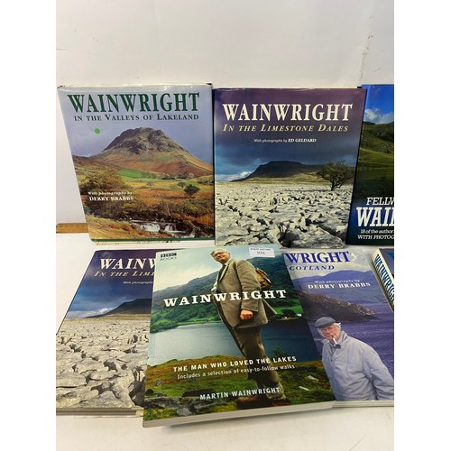 926 - Collection of Wainwright fell walking books.