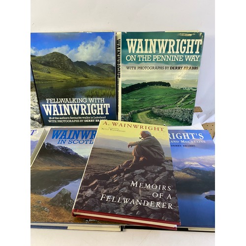 926 - Collection of Wainwright fell walking books.