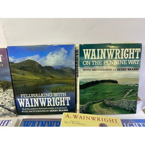 926 - Collection of Wainwright fell walking books.