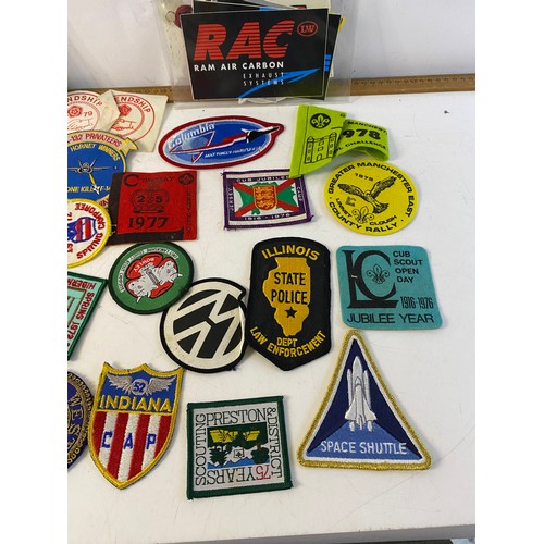 936 - Large collection of patches and stickers from Space, motorcycle, Police and Scouts.