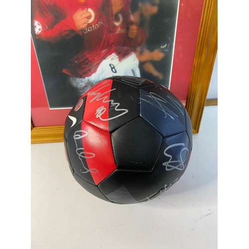 757 - 2011 Manchester United signed football and a framed and signed Wayne Rooney picture. Autographs incl... 