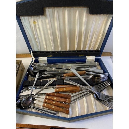 776 - Assortment of cutlery including Gourmet Settings, Mother of Pearl with sterling silver and knife set... 