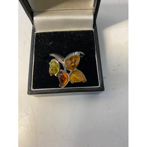 795 - Sterling silver and tri coloured amber ring size R