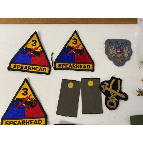 939 - Collection of Military patches, Badges and Pins.