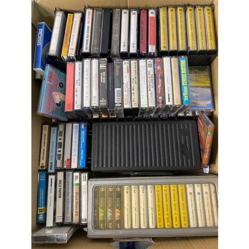 708 - Box of cassette tapes and storage boxes. Mixed genres